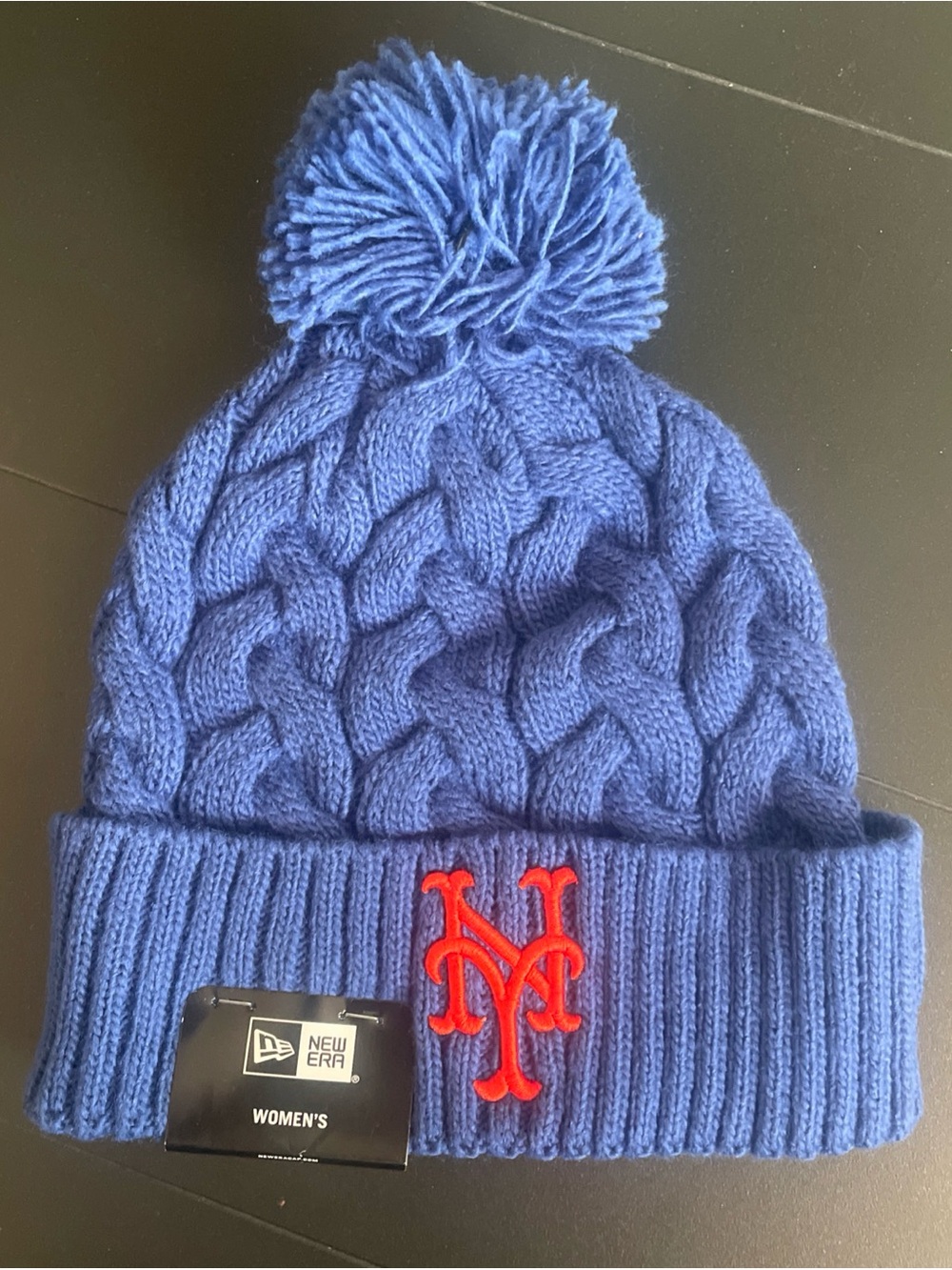 New Era Royal Blue Cable Knit Pom Beanie with Orange NY Logo
